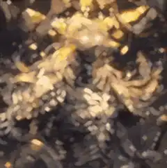 Golden armored figure with glowing eyes