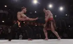 Chuck Norris kicks opponent in the groin
