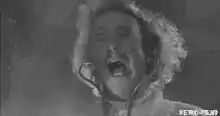 Mel Brooks screaming with headphones