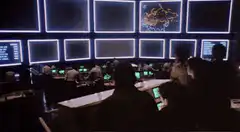 Control room screens flash and explode
