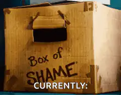 Box of Shame cat peeking out