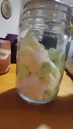Colorful marshmallows in a glass jar