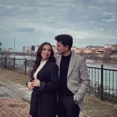 Couple standing by river