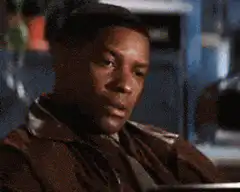 Denzel Washington puts hand on chest