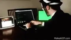 Guy Fawkes mask hacker typing