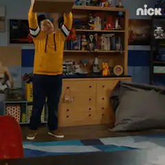 Boy kicks box then hugs it