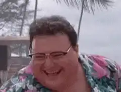 Man in Hawaiian shirt laughing hysterically