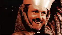 Michael Sheen as King Arthur smiling