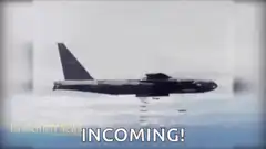B-52 bomber dropping bombs incoming
