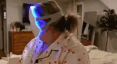 woman wearing led light therapy mask