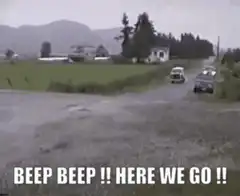 VW Bus splashes through puddle