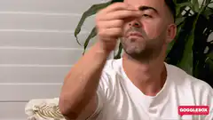 Man flicks dust off nose