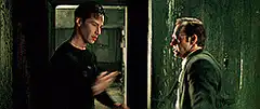 Agent Smith punches Neo