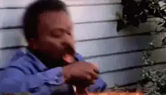 Man eating pizza and choking