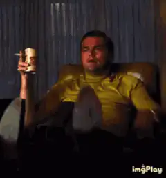 Tyler Durden pointing and drinking beer