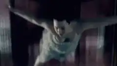 woman screaming with arms outstretched