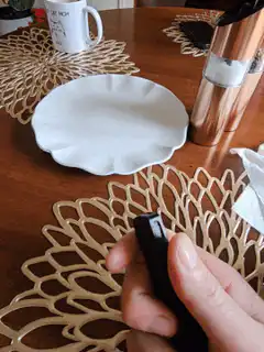 Hand opening a pocket knife