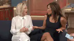 Meredith Vieira and guest hug on set