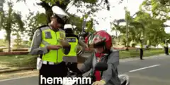 Motorcyclist gets a ticket and says semangat pak