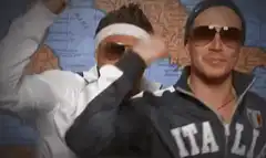 Two men in Italy jackets dancing