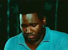 Man looks down then woman looks at him