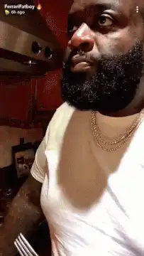 Man with beard making surprised face