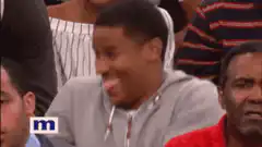 Man sticking tongue out and laughing