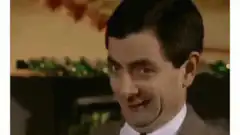 Mr. Bean sticking tongue out