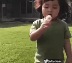 Toddler blowing bubbles