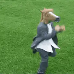 Horse in suit dancing on grass