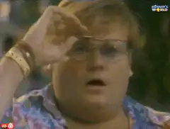 Elton John adjusts his glasses