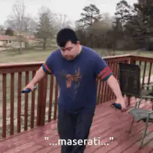 Man dancing on deck with Maserati caption