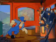Popeye shovels coal in train cab