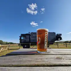 Landlord beer pint with off-road truck