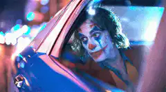 Joker in car with clown makeup