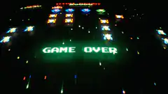 Game Over screen with falling enemies