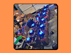 rows of computer fans with blue lights