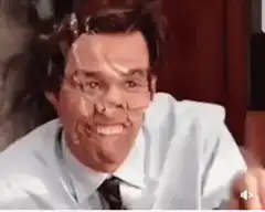 Jim Carrey with face paint waving