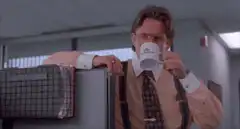 Bill Lumbergh sips coffee in office