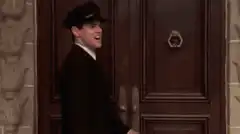 Doorman hits door knocker and says ow