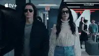 Klaus and Lila walking in sunglasses