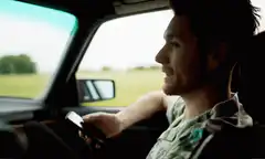Man throws phone out of car window