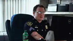 Officer Kowalski talking to a bird