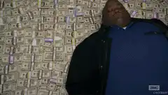 Bubbles lying on a pile of money