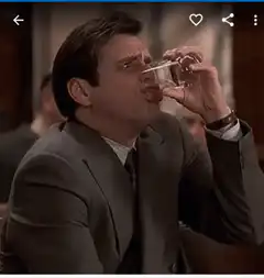 Michael Scott drinks and spits out water