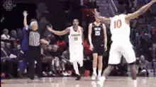 NBA player celebrates with teammates