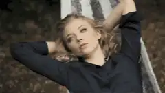 Natalie Dormer lying on a blanket