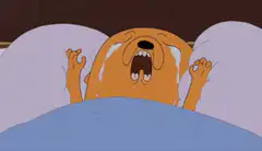Jake the Dog crying in bed