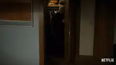 Man closes closet door