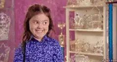 Girl smiles and looks around